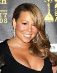 Pregnant Mariah Carey Shares Photo of Her Butterfly-Painted Belly
