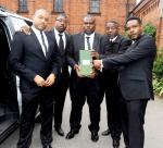 Amy Winehouse's Bodyguards Take a Picture With Her Ashes