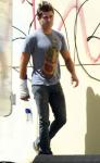Zac Efron Pictured Sporting a Cast After Injuring Himself on Set