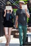 Emma Stone and Andrew Garfield Hold Signs to Promote Charities During Outing