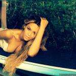Beyonce Flashes Cleavage in Holiday Photos