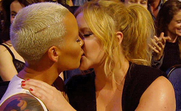 Amber Rose and Amy Schumer Lock Lips at MTV Movie Awards