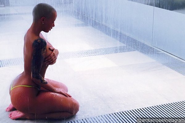 Amber Rose Wears Nothing But Tiny String Thong in New Photo