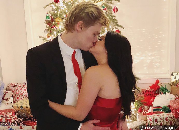 Ariel Winter Celebrates Christmas by Sharing Steamy Kiss With BF in Skimpy Dress