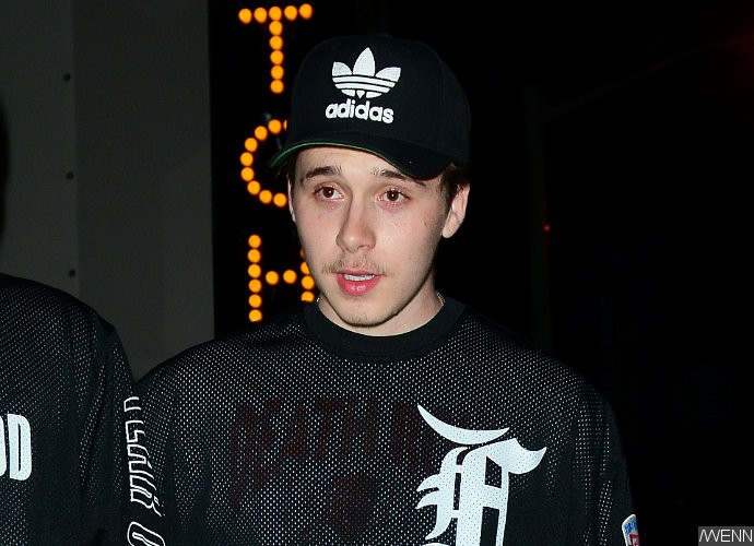 Brooklyn Beckham Debuts New Mustache While Keeping His Controversial Tattoo Hidden