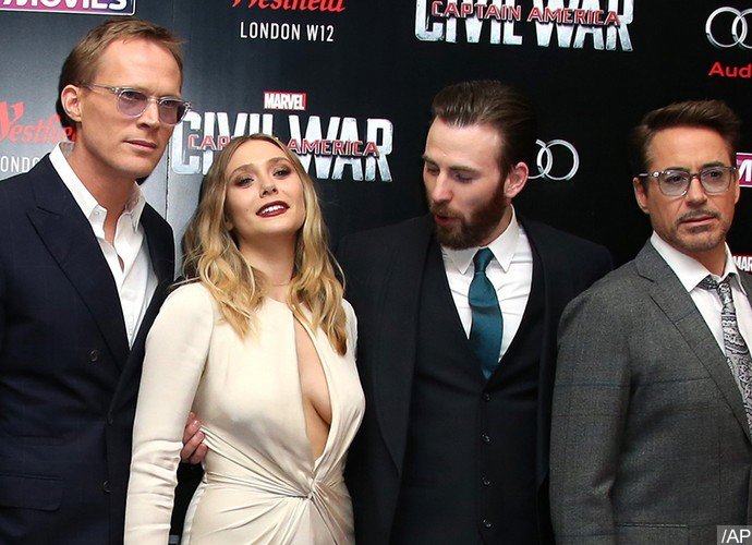 Chris Evans Can't Stop Staring at Elizabeth Olsen's Boobs at 'Civil War' London Premiere