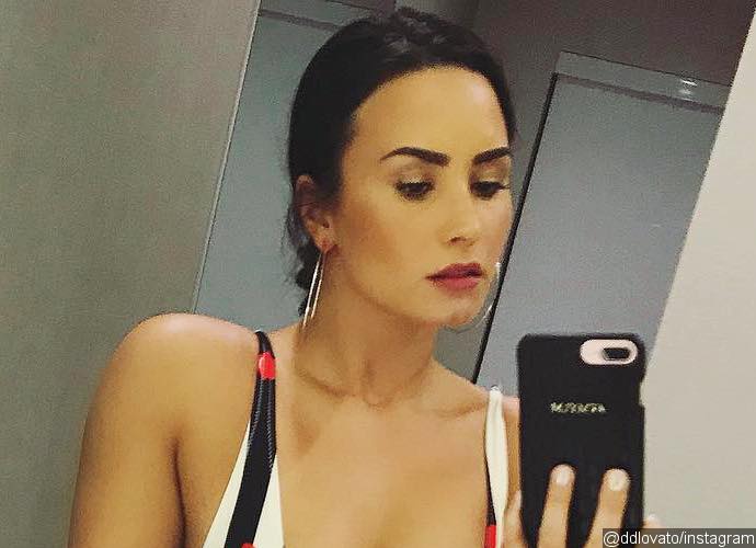 Demi Lovato Flaunts Major Cleavage in Plunging Bathing Suit - See the Sexy Pic