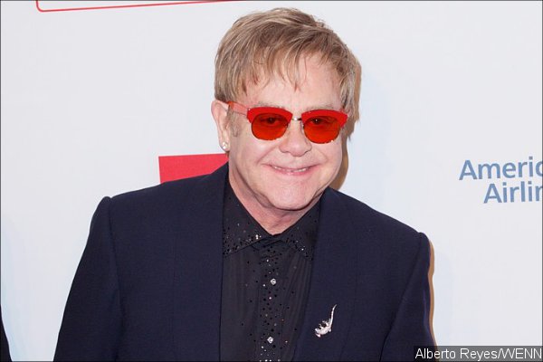 Video: Elton John Falls Off Chair at Tennis Tournament