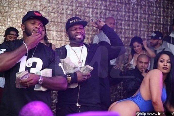 50 Cent Pictured Holding Stacks of Money at Strip Club Despite Bankruptcy Filing
