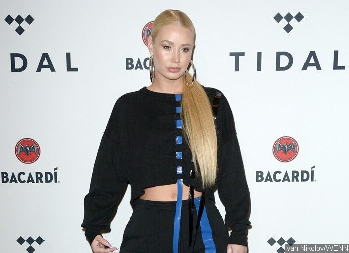 Iggy Azalea Flashes Bra in Totally Sheer Top, Receives a Rose From Young Fan on Valentine's Day