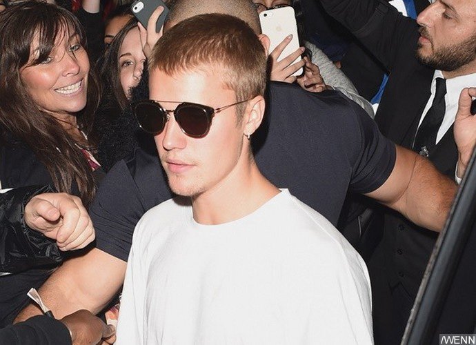 OMG! Justin Bieber Punches Barcelona Fan in the Face, Leaves Him Bleeding