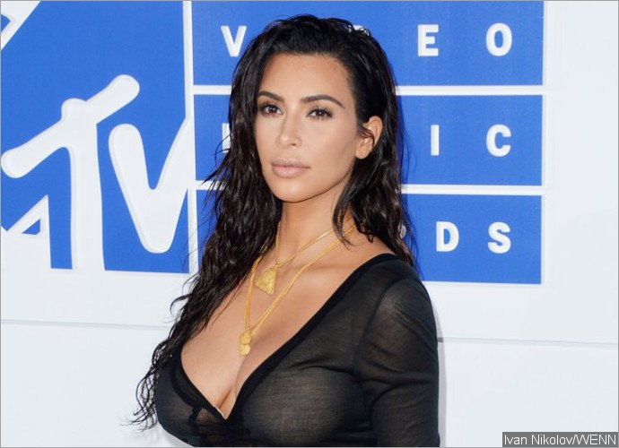 Kim Kardashian Bares Serious Underboobs While Going Topless in This Raunchy Selfie