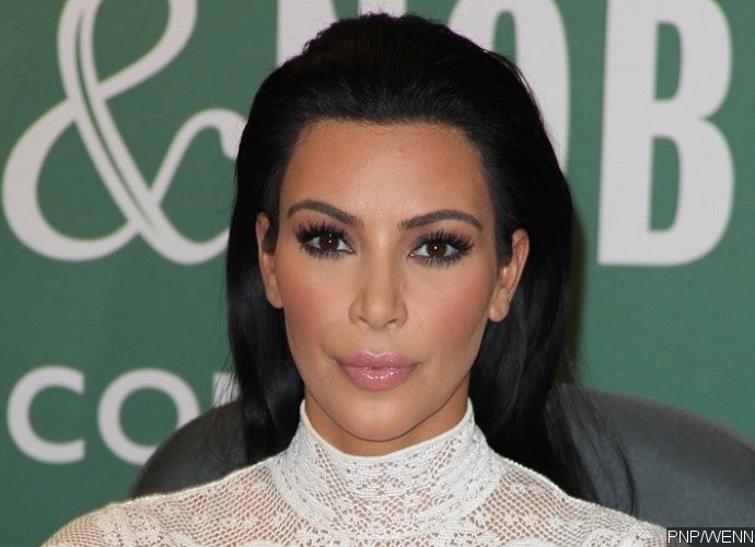 Kim Kardashian Flaunts Her Tempting Figure in These Bedazzled 'Bedtime' Bikini Snaps