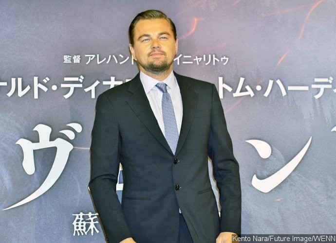 Leonardo DiCaprio Gets Flirty With Pretty Brunette During Guys' Night Out