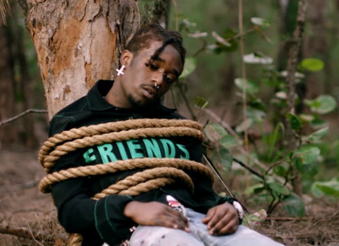 Lil Uzi Vert Tied Down to a Tree in Music Video for 'The Way Life Goes' Remix Ft. Nicki Minaj