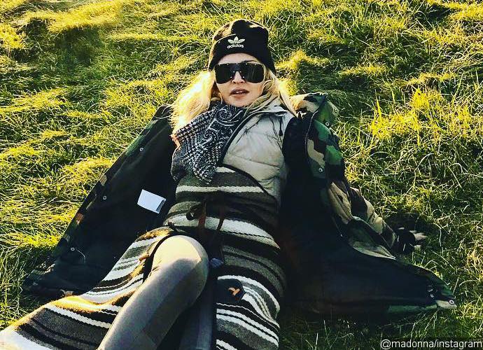 Madonna Slammed for Her Bizarre Topless Selfie: 'You've Ruined Your Face'