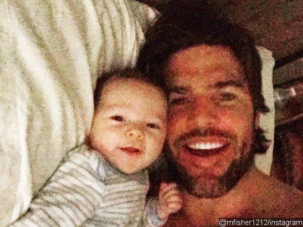 Mike Fisher Shares Shirtless Selfie in Bed With Son Isaiah