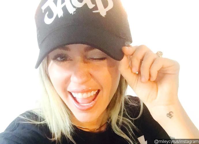 Miley Cyrus Calls Fans 'Rude' for Saying She Looks Pregnant in Birthday Photo