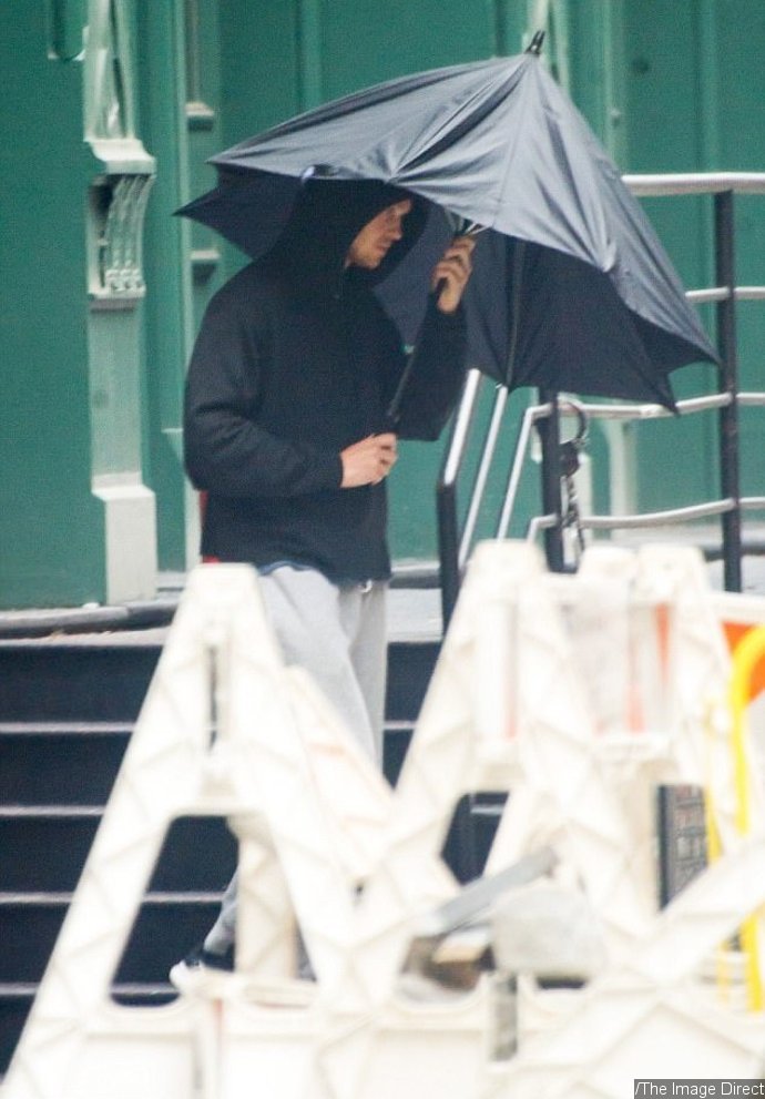 Taylor Swift and Joe Alwyn Hide Behind Umbrella While Heading to the Gym