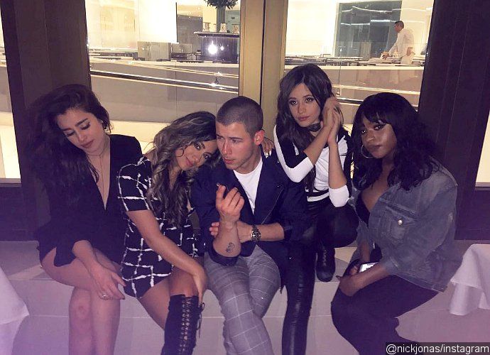 Nick Jonas Doesn't Want to 'Go to Work' When He's Surrounded by These Sexy Ladies