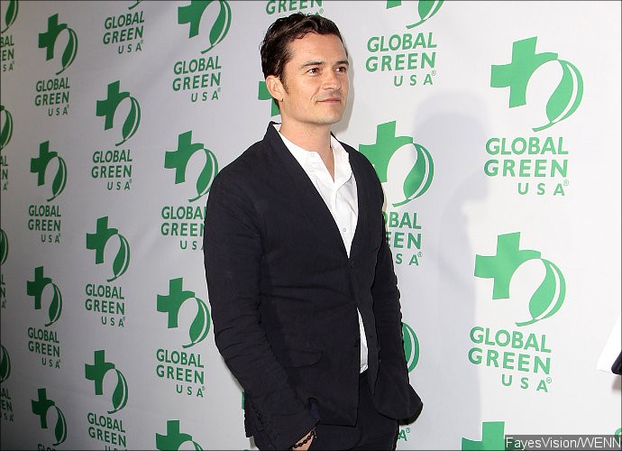 Orlando Bloom Caught Cozying Up to Sexy Model at Coachella