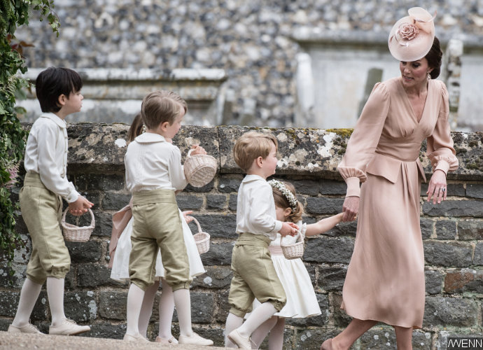 prince-george-gets-scolded-by-kate-middleton-after-stepping-on-pippa-middleton-s-wedding-dress.jpg
