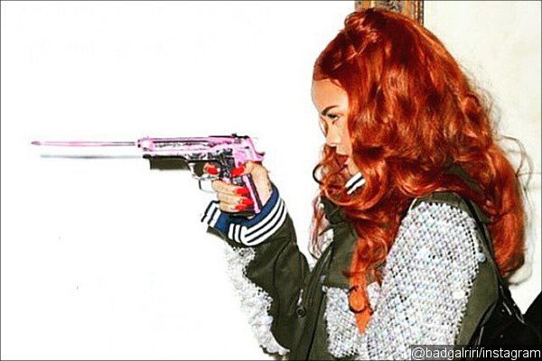 Rihanna Posts Daring Gun-Toting Photo on Instagram