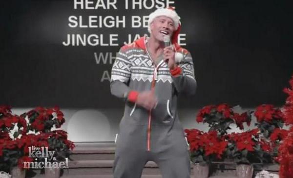 Video: The Rock Sings 'Here Comes Santa Claus' in Onesie