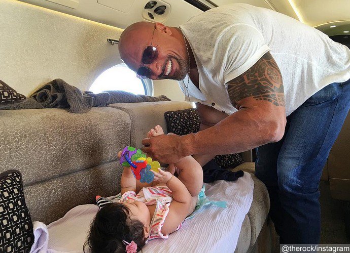 Bring on the Baby Wipes! The Rock Takes on Mid-Flight Diaper Duty With Daughter Jasmine