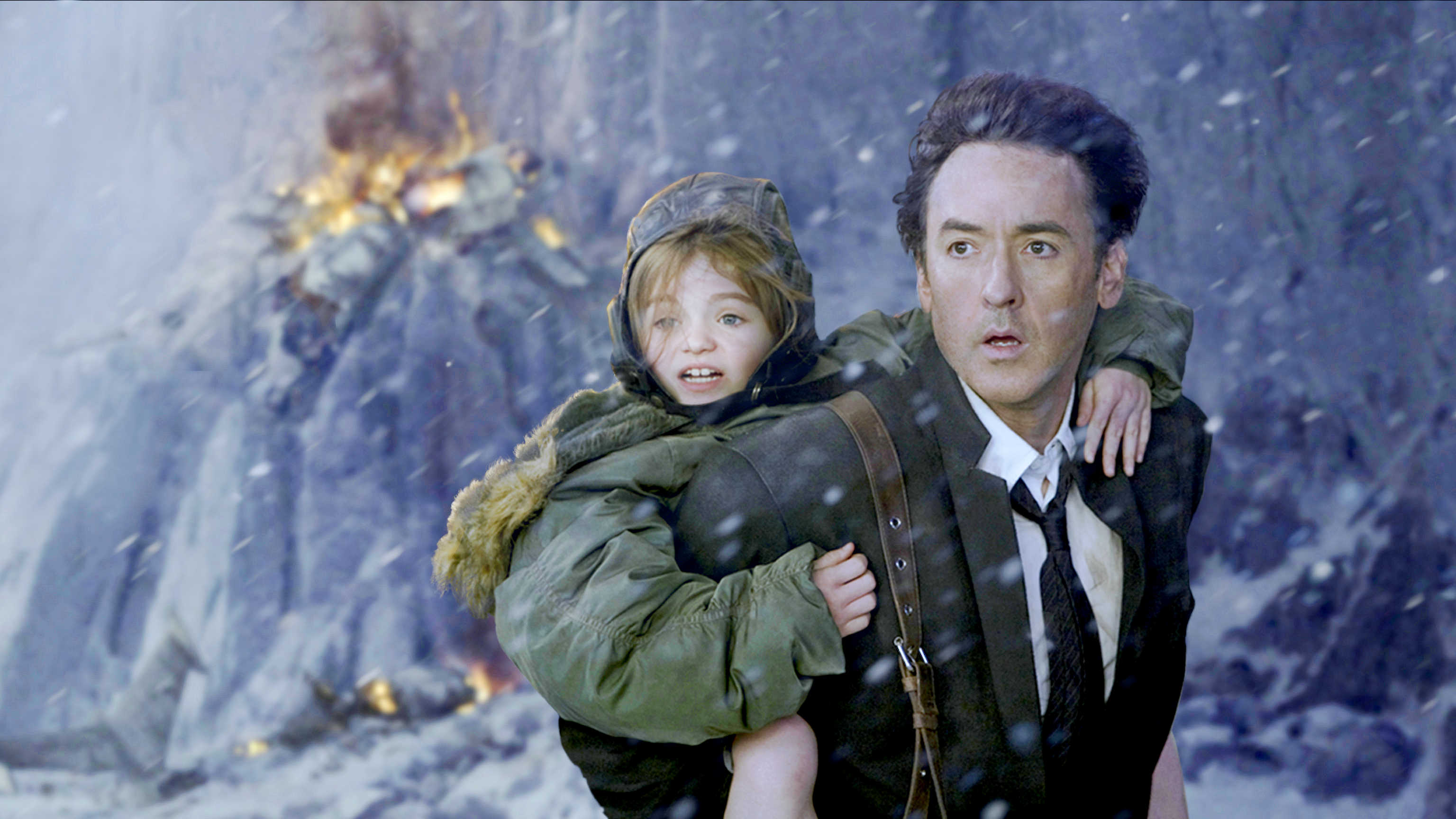 Morgan Lily stars as Lilly and John Cusack stars as Jackson Curtis in Columbia Pictures' 2012 (2009)