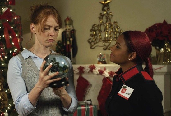 Alicia Witt (stars as Meg) and Christina Milian in Lifetime's An Snow Globe Christmas (2013)