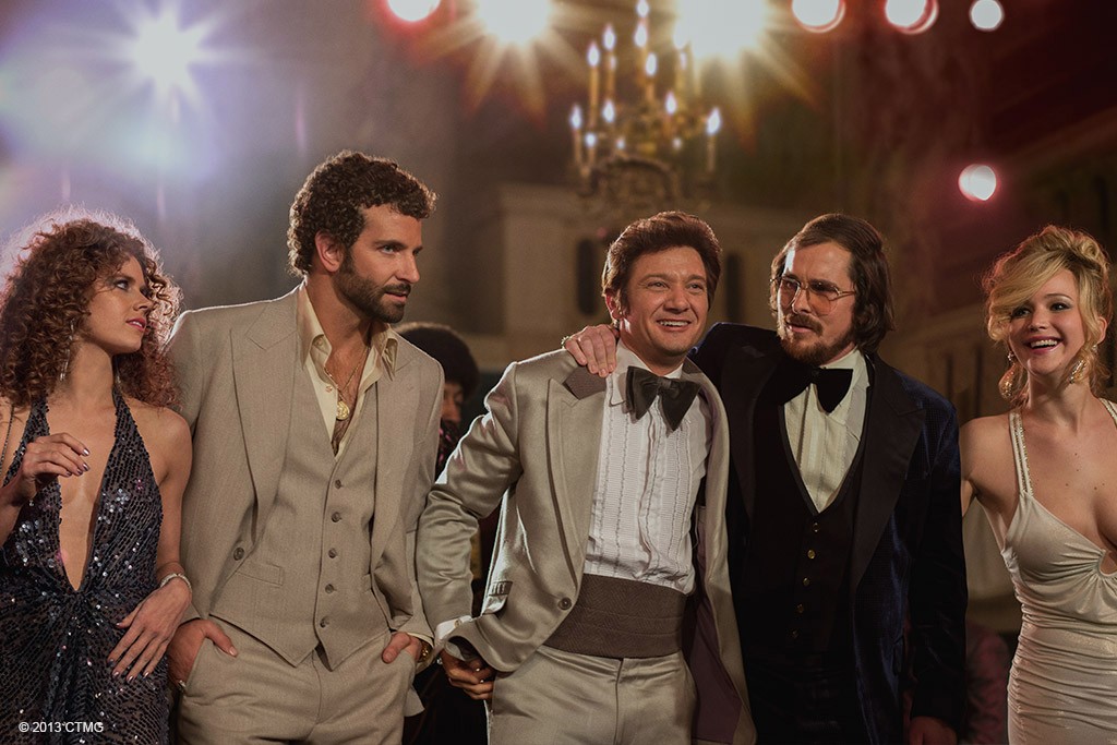 Amy Adams, Bradley Cooper, Jeremy Renner, Christian Bale and Jennifer Lawrence in Columbia Pictures' American Hustle (2013). Photo credit by Francois Duhamel.