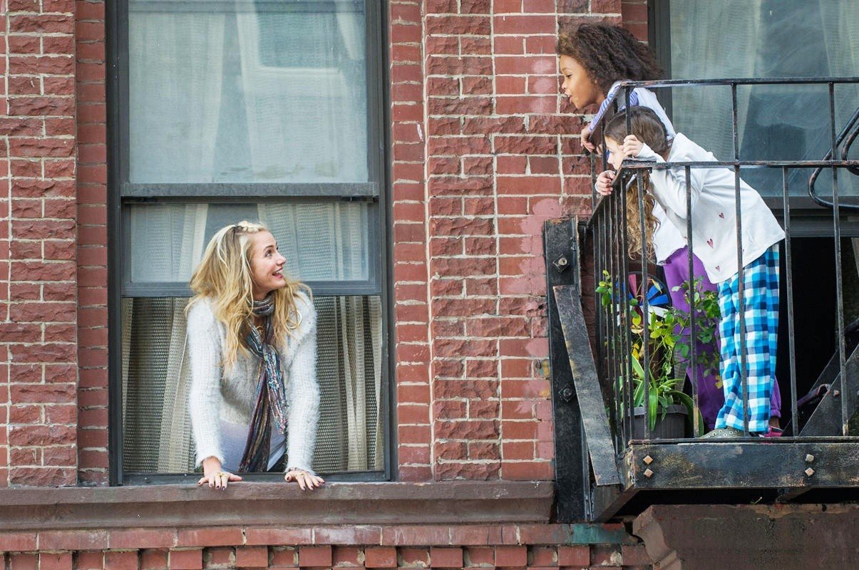 Cameron Diaz stars as Miss Hannigan and Quvenzhane Wallis stars as Annie in Columbia Pictures' Annie (2014). Photo credit by Barry Wetcher.
