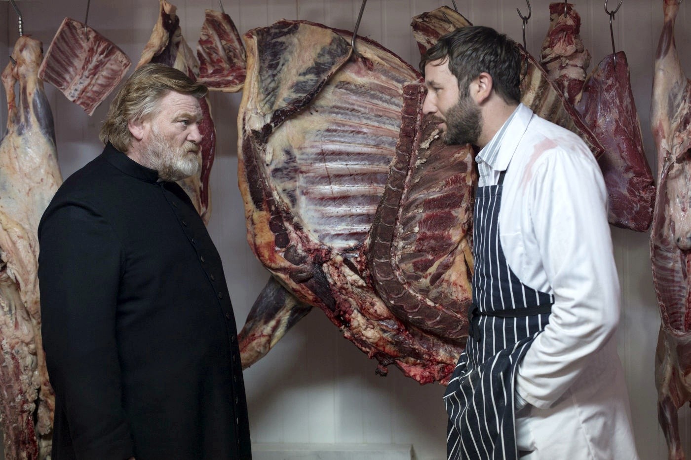 Brendan Gleeson (stars as Father James Lavelle) and Chris O'Dowd in Fox Searchlight Pictures' Calvary (2014)