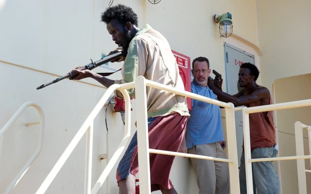 Mahat M. Ali, Tom Hanks, and Faysal Ahmed in Columbia Pictures' Captain Phillips (2013). Photo credit by Jasin Boland.