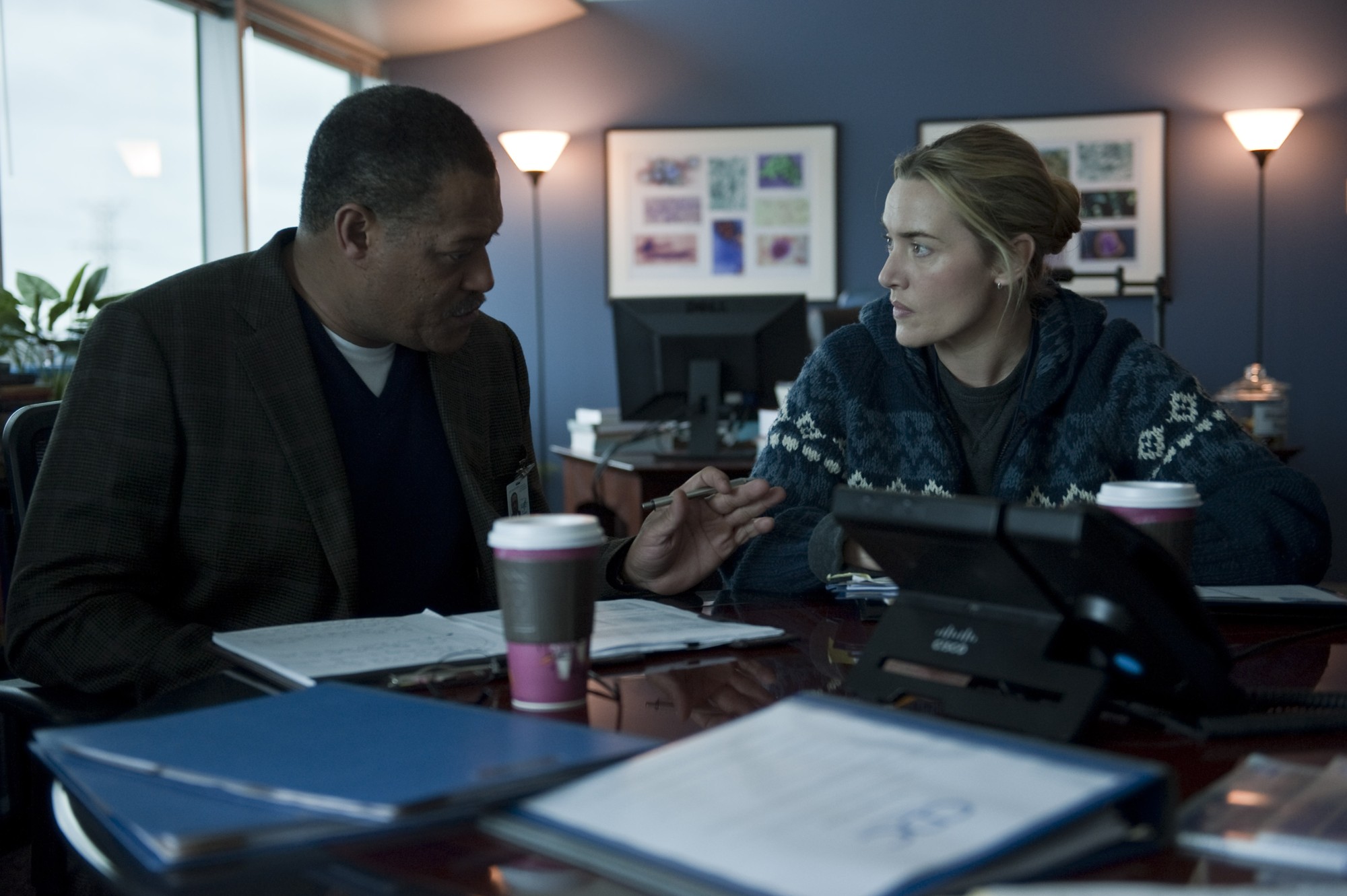 Laurence Fishburne stars as Dr. Ellis Cheever and Kate Winslet stars as Dr. Erin Mears in Warner Bros. Pictures' Contagion (2011)