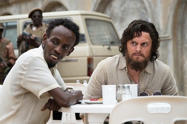 Barkhad Abdi stars as Abdi and Evan Peters stars as Jay Bahadur in Echo Bridge's The Pirates of Somalia (2017)