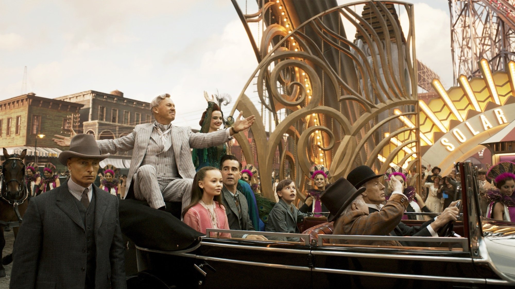 Michael Keaton, Eva Green, Nico Parker, Colin Farrell and Finley Hobbins in Walt Disney Pictures' Dumbo (2019)