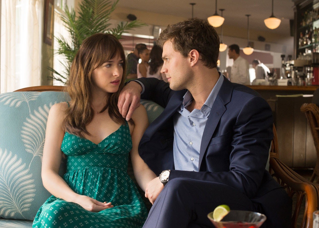 Dakota Johnson stars as Anastasia Steele and Jamie Dornan stars as Christian Grey in Fifty Shades of Grey (2015)