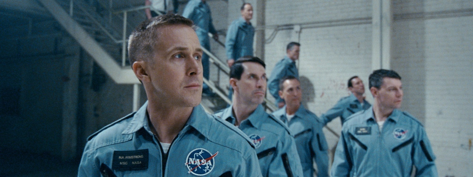 Ryan Gosling stars as Neil Armstrong and Patrick Fugit stars as Elliott See in Universal Pictures' First Man (2018)
