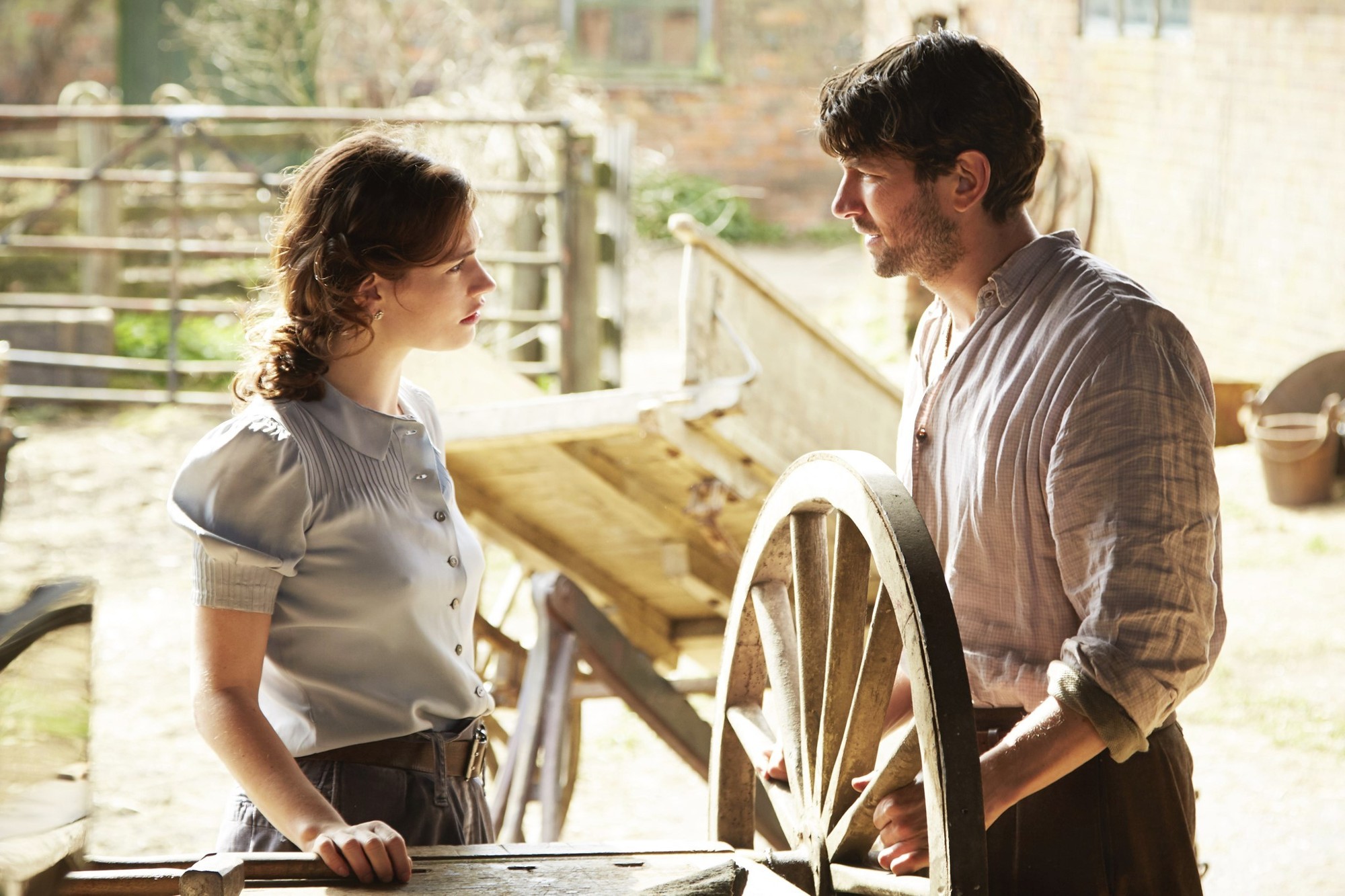 Lily James stars as Juliet Ashton and Michiel Huisman stars as Dawsey Adams in Netflix's The Guernsey Literary and Potato Peel Pie Society (2018)
