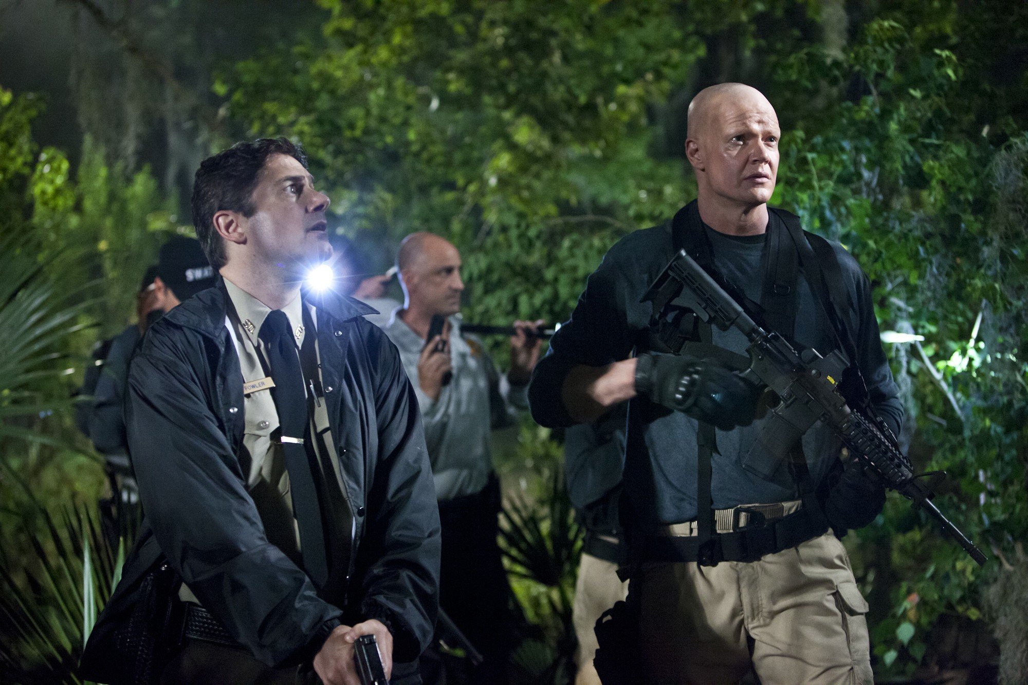 Zach Galligan stars as Sheriff Fowler and Derek Mears stars as Hawes in Dark Sky Films' Hatchet III (2013)