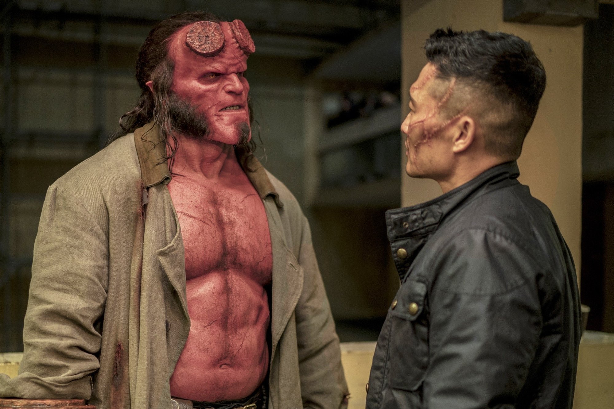 David Harbour stars as Hellboy and Daniel Dae Kim stars as Ben Daimio in Lionsgate Films' Hellboy (2019)