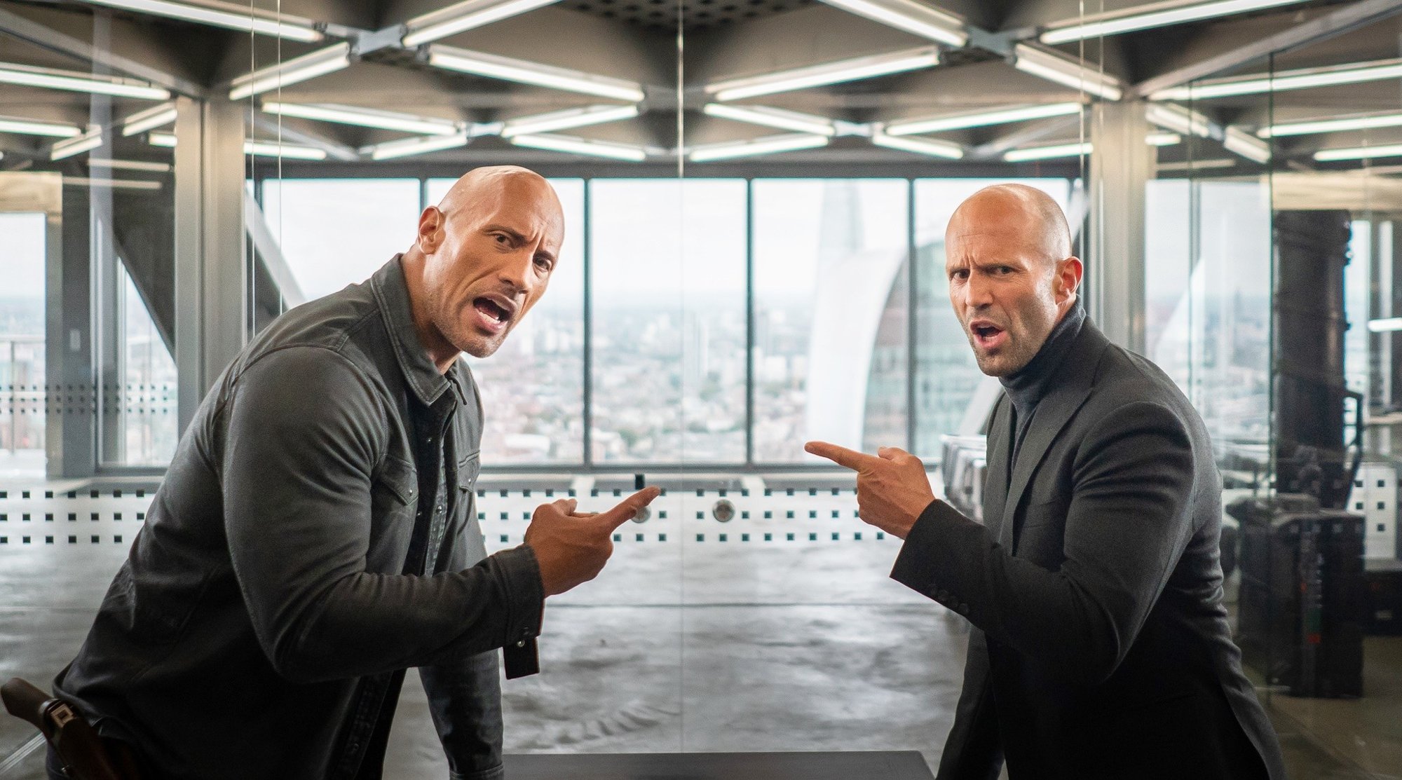 The Rock stars as Luke Hobbs and Jason Statham stars as Deckard Shaw in Universal Pictures' Fast & Furious Presents: Hobbs & Shaw (2019)