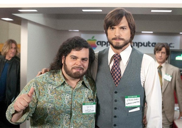 Josh Gad stars as Steve Wozniak and Ashton Kutcher stars as Steve Jobs in Open Road Films' jOBS (2013)