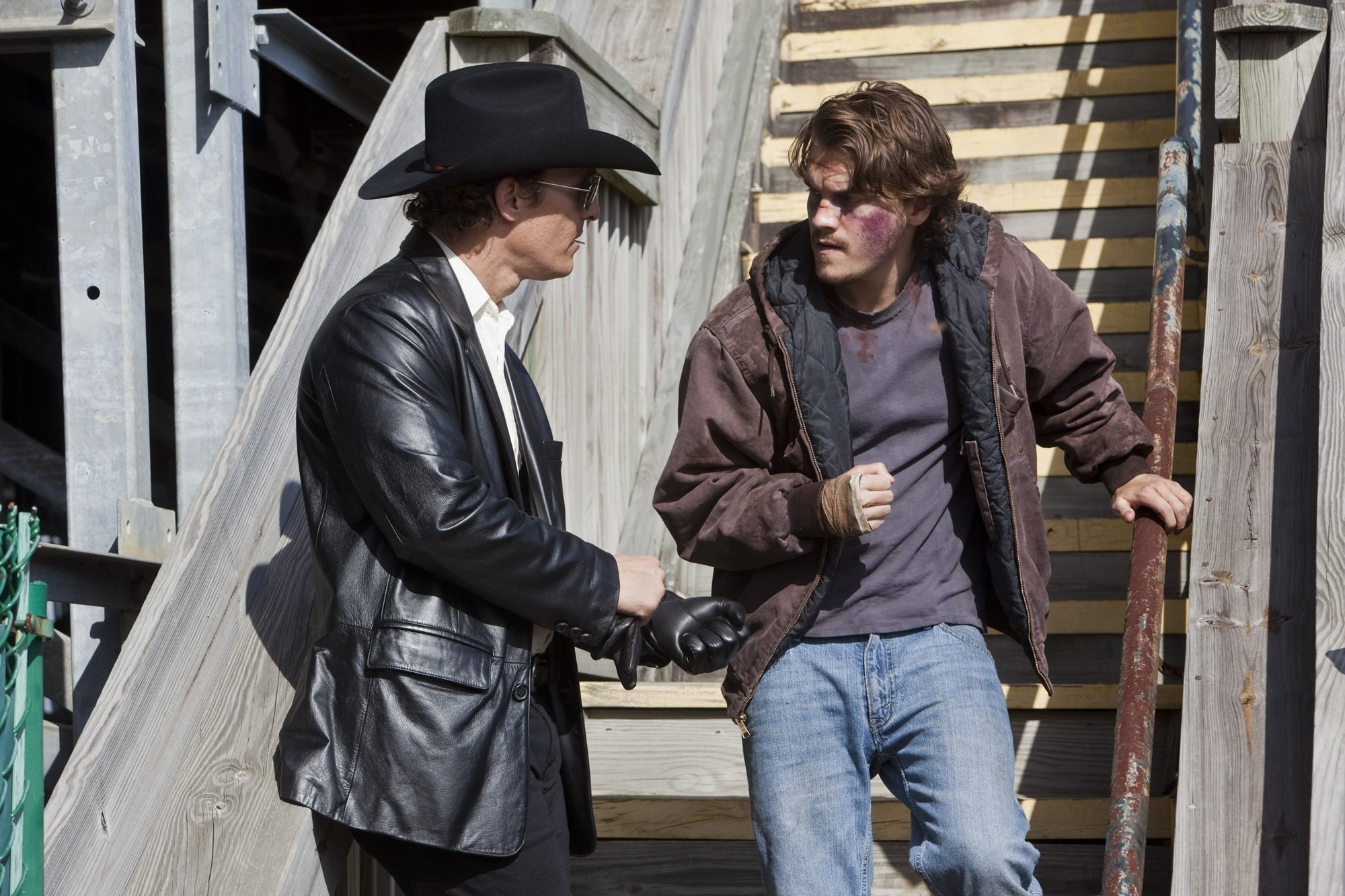 Matthew McConaughey stars as Killer Joe Cooper and Emile Hirsch stars as Chris Smith in LD Entertainment's Killer Joe (2012)