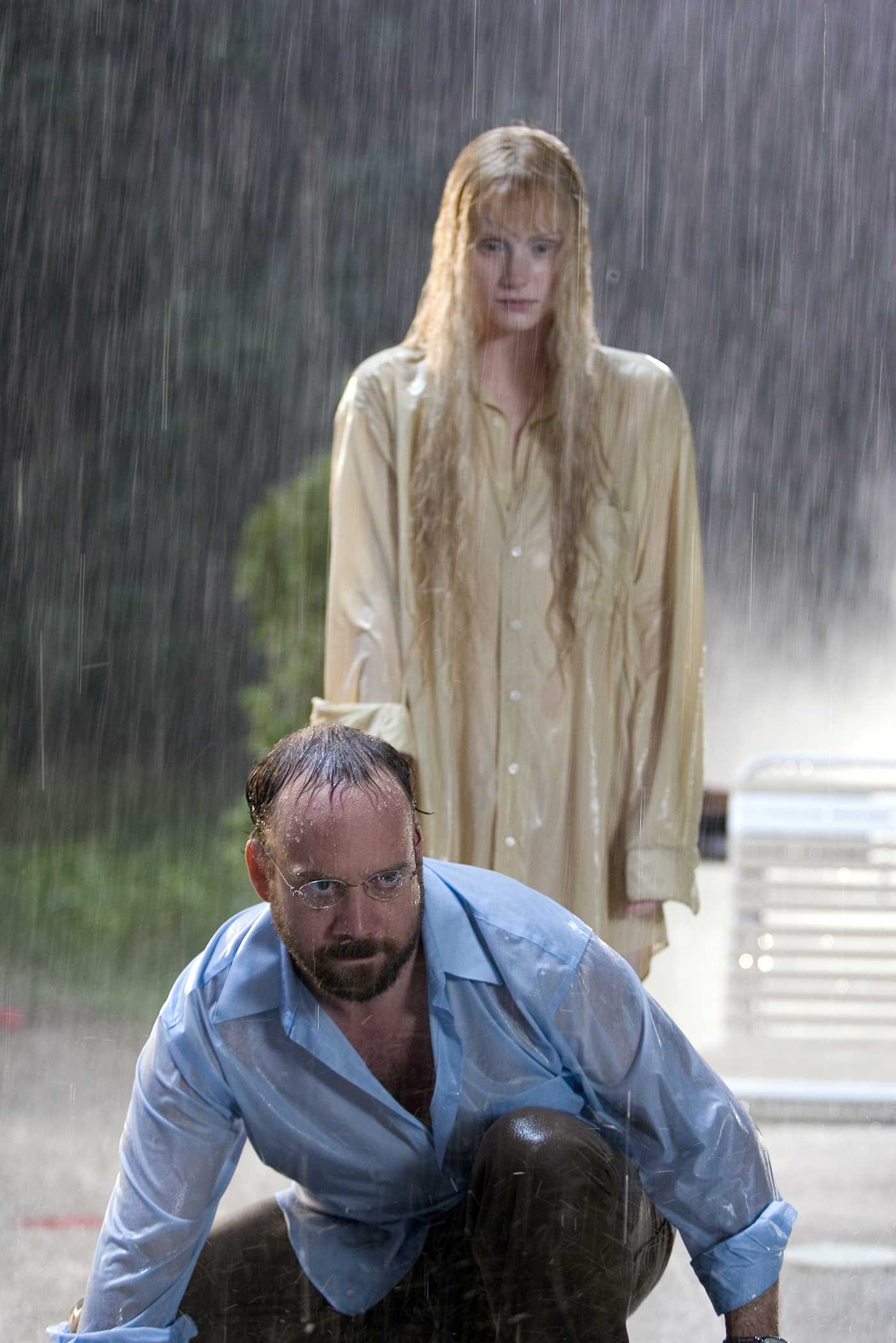 PAUL GIAMATTI as Cleveland Heep and BRYCE DALLAS HOWARD as Story star in Warner Bros. Pictures' sci-fi fantasy suspense thriller 