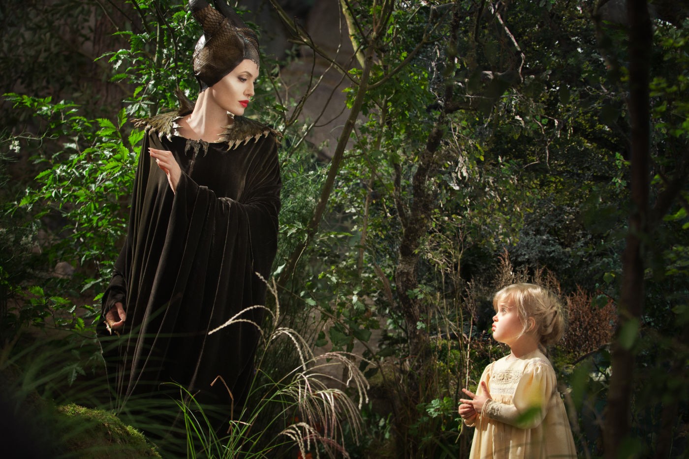 Angelina Jolie stars as Maleficent and Vivienne Jolie-Pitt stars as Toddler Princess Aurora in Walt Disney Pictures' Maleficent (2014)