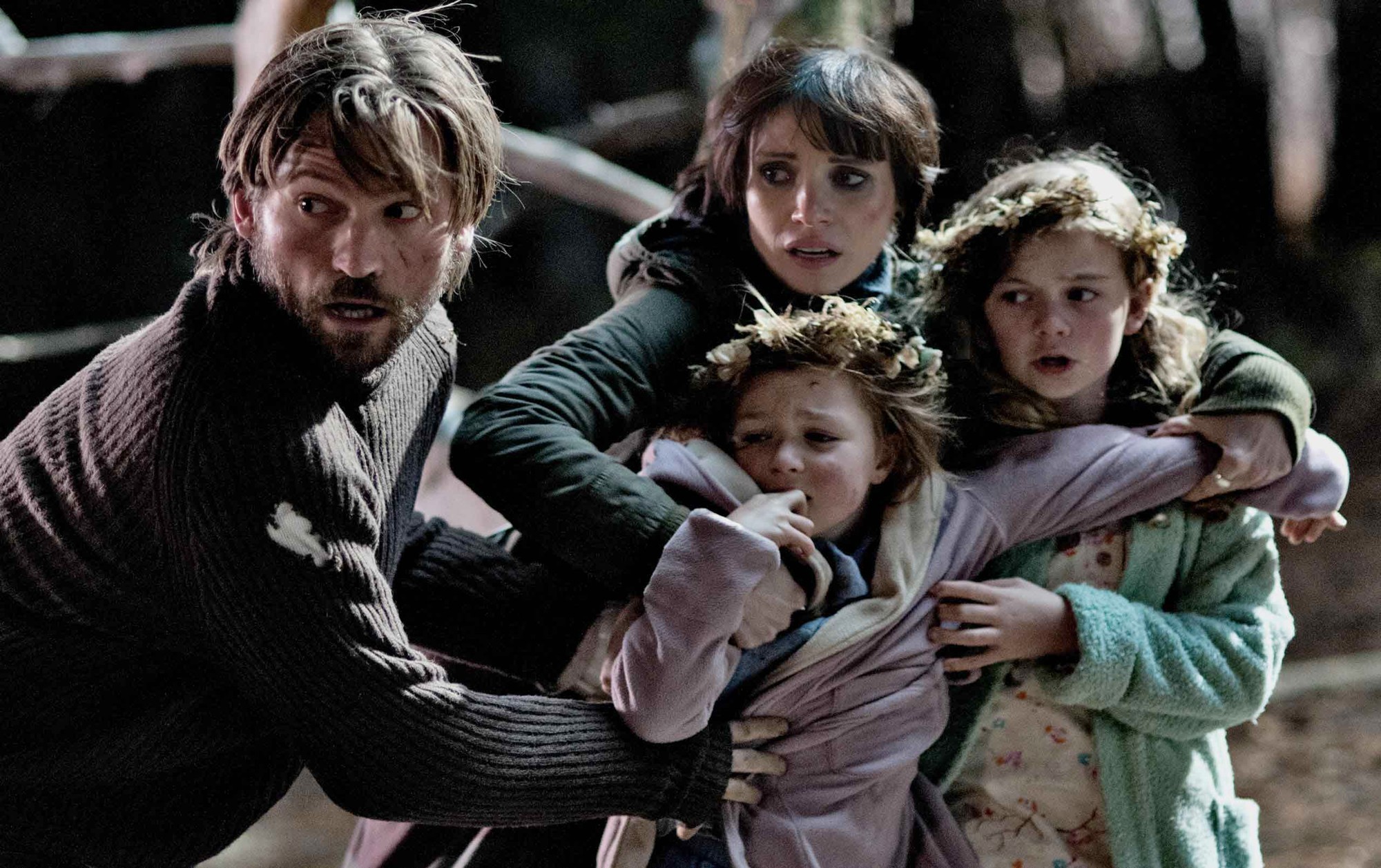 Nikolaj Coster-Waldau, Jessica Chastain, Isabelle Nelisse and Megan Charpentier in Universal Pictures' Mama (2013)