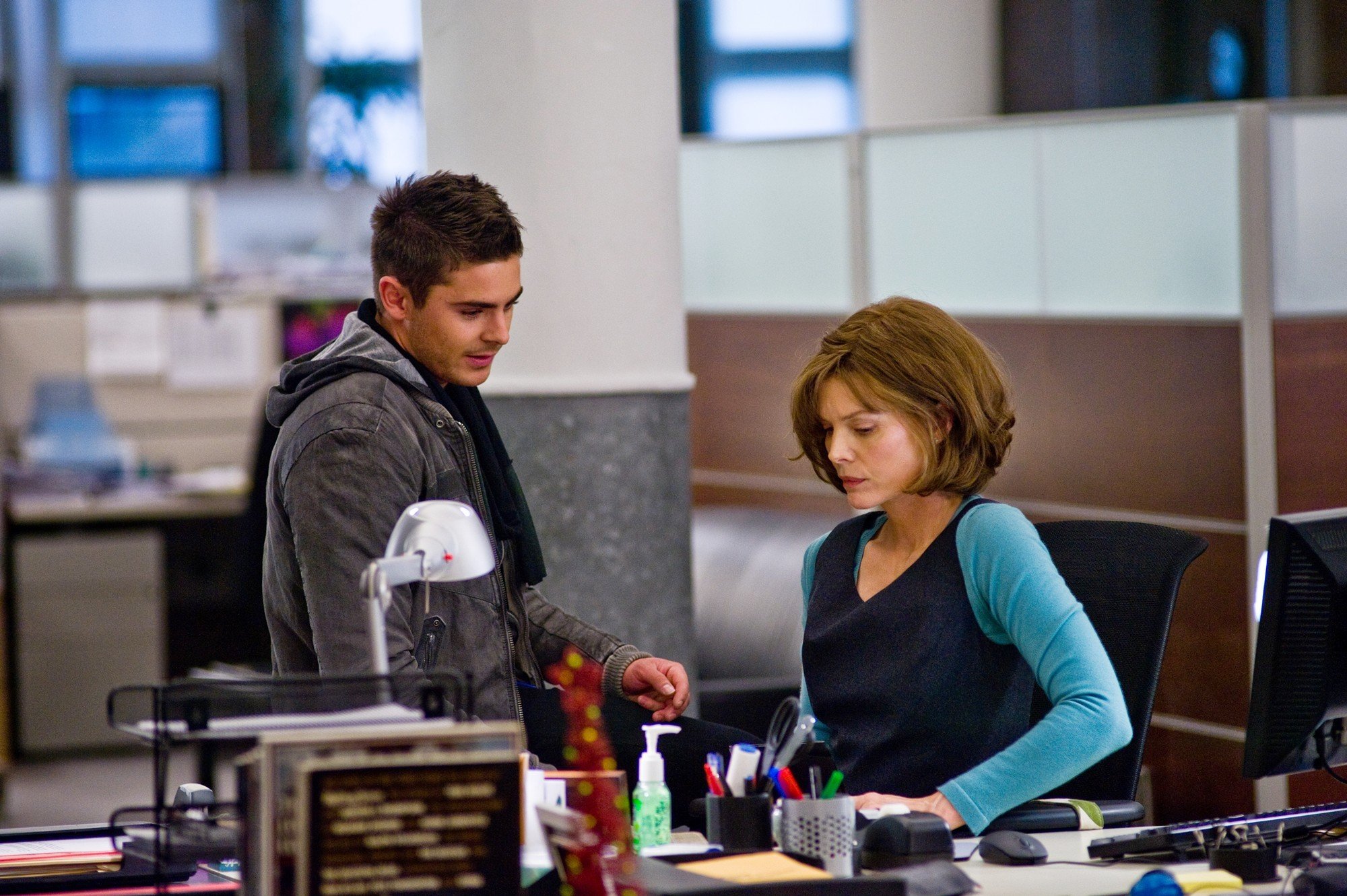 Zac Efron stars as Paul and Michelle Pfeiffer stars as Ingrid in Warner Bros. Pictures' New Year's Eve (2011)
